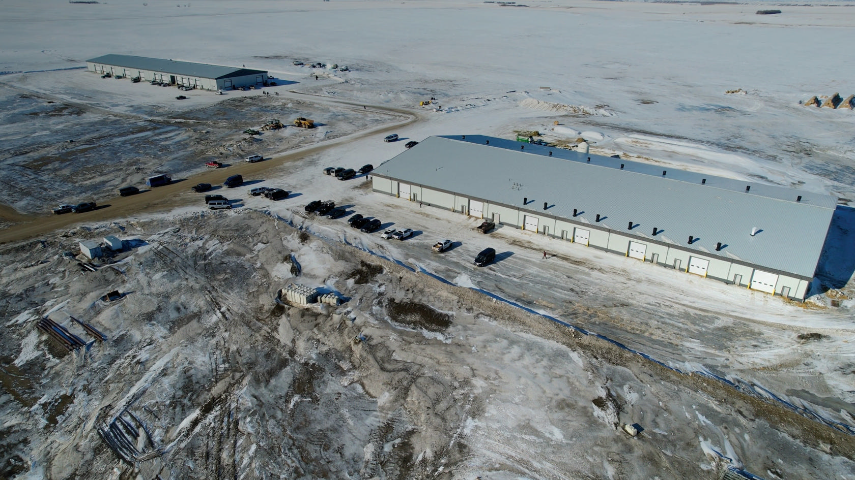 Aerial view of a New Standard Ag barn and feed-mill build on the Manitoba prairie